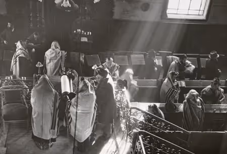 Worshippers in a synagogue (Munkacs, Ukraine, date unknown).