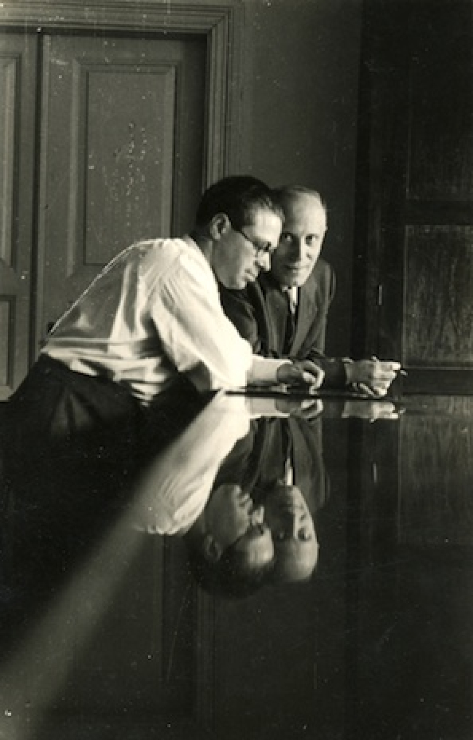 Max Weinreich (left) and unidentified man, YIVO, Vilna, 1930s. Source - YIVO