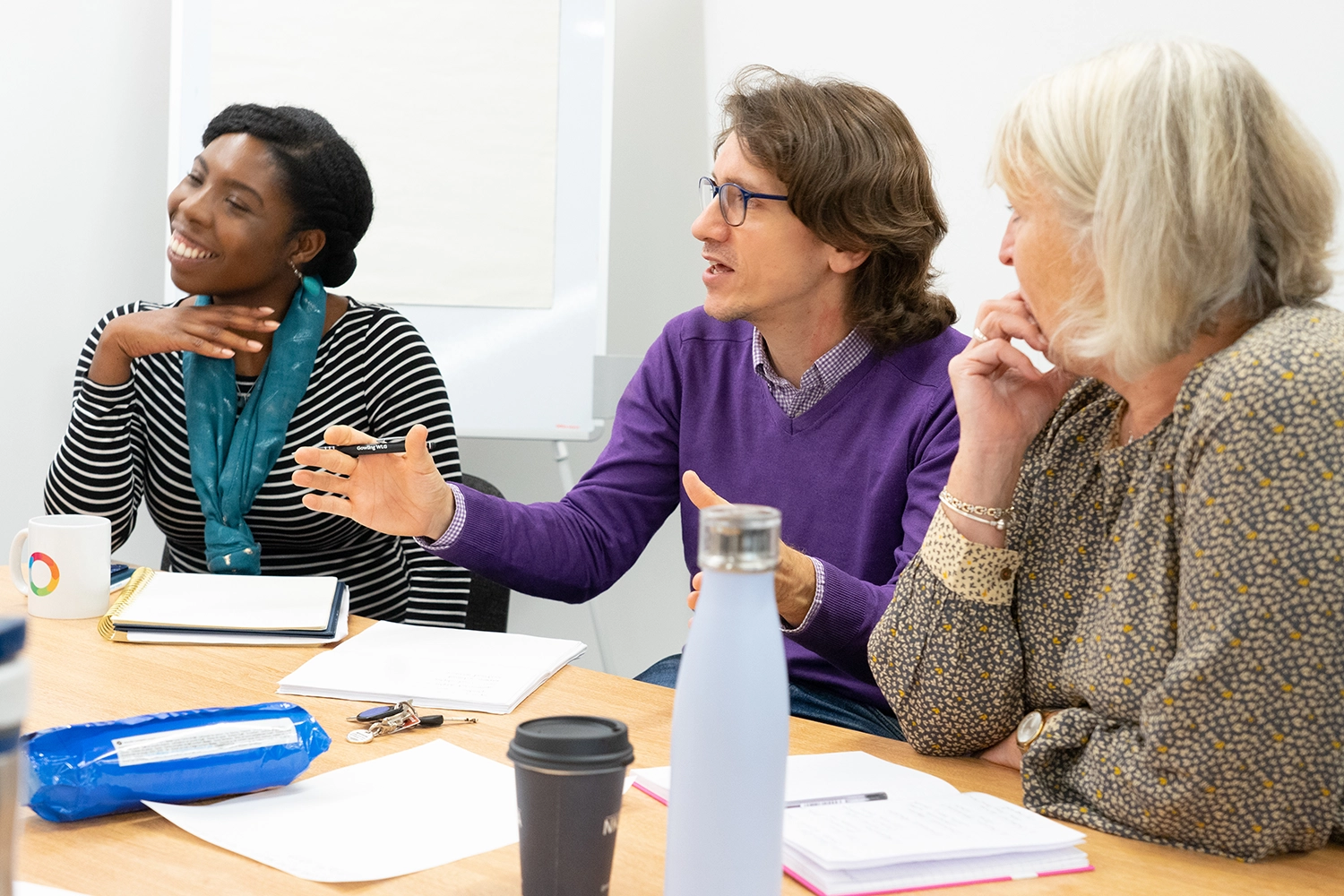 A photo of skills builder staff attending a Team Day and brainstorming an activity together