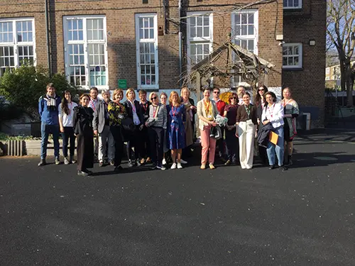 An image in the Czech Republic showing skills builder staff meeting with staff members from Schola Empirica.