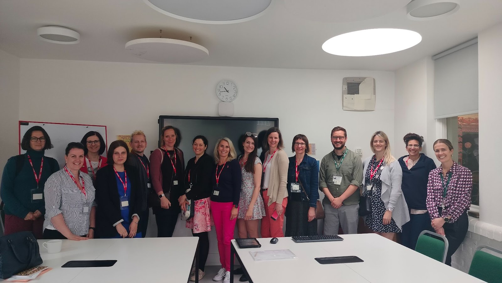 Group of teachers from Czechia smiling at the camera with James Prideaux of Skills Builder