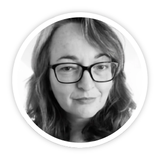 An image of Vicky Smith, Senior Education Associate at Skills Builder Global. She is wearing black glasses and has a kind smile.