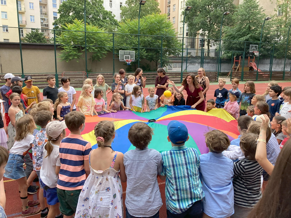 An image of school children learning in an arts and crafts class