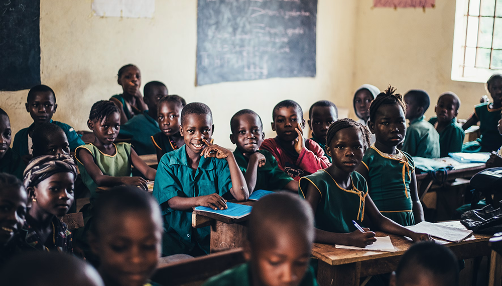 An image of school children learning in an arts and crafts class