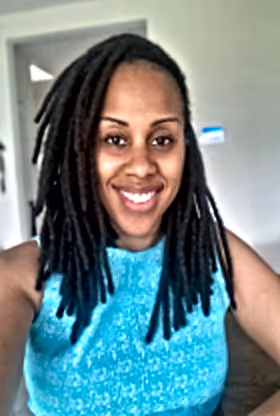 Woman with long dreadlocks smiling