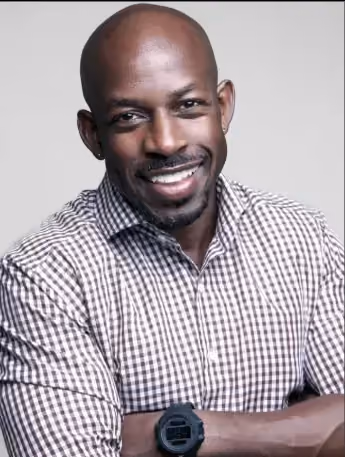 Professional headshot of smiling male staff member