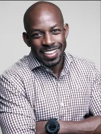Professional headshot of smiling male staff member