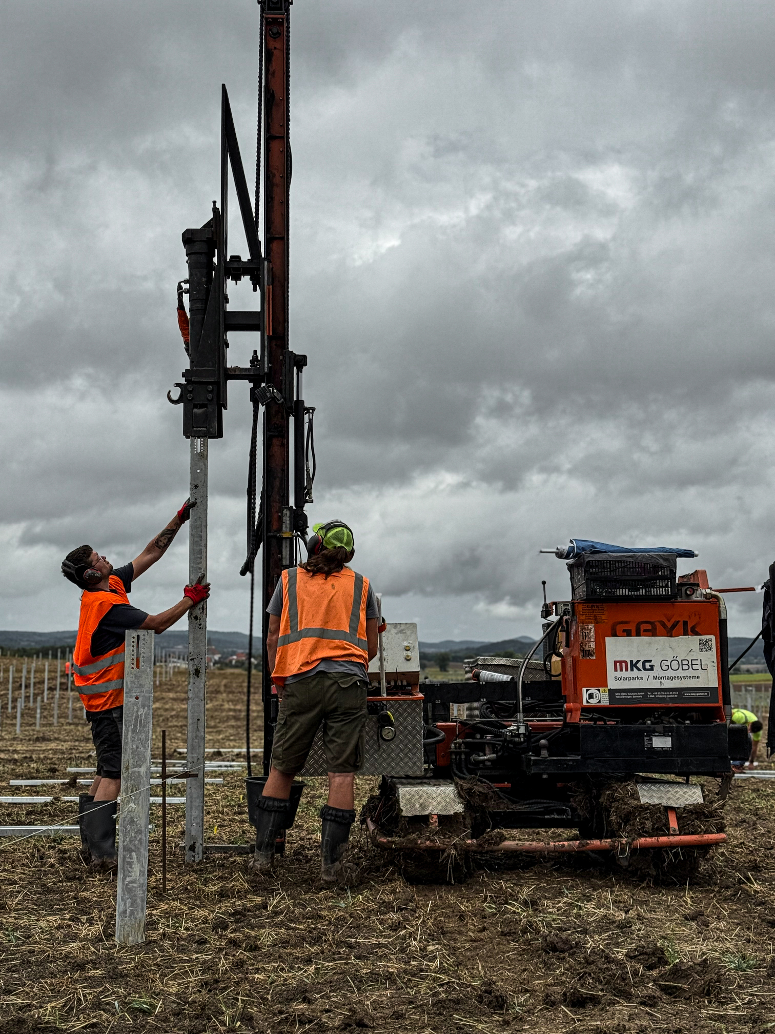 [background image] image of construction team meeting in a trailer office