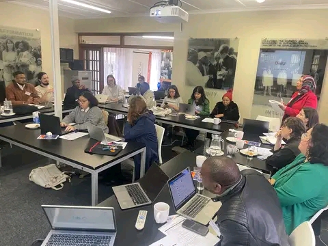 Group discussion among coalition representatives.