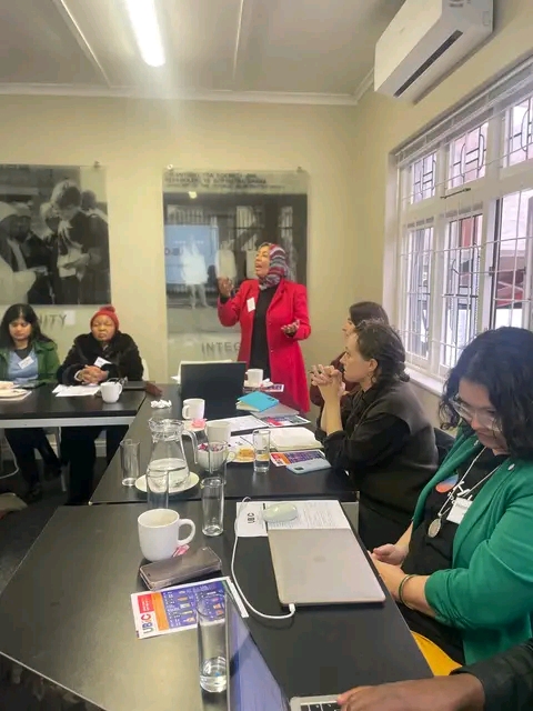 Coalition members in a discussion meeting.