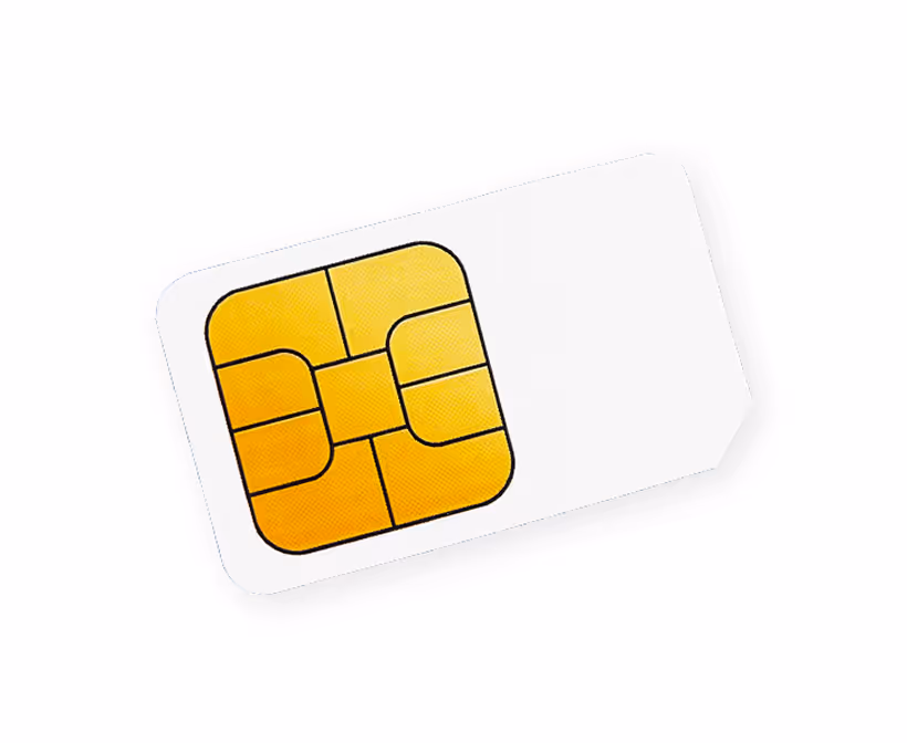 A sim card sitting on top of a white surface.