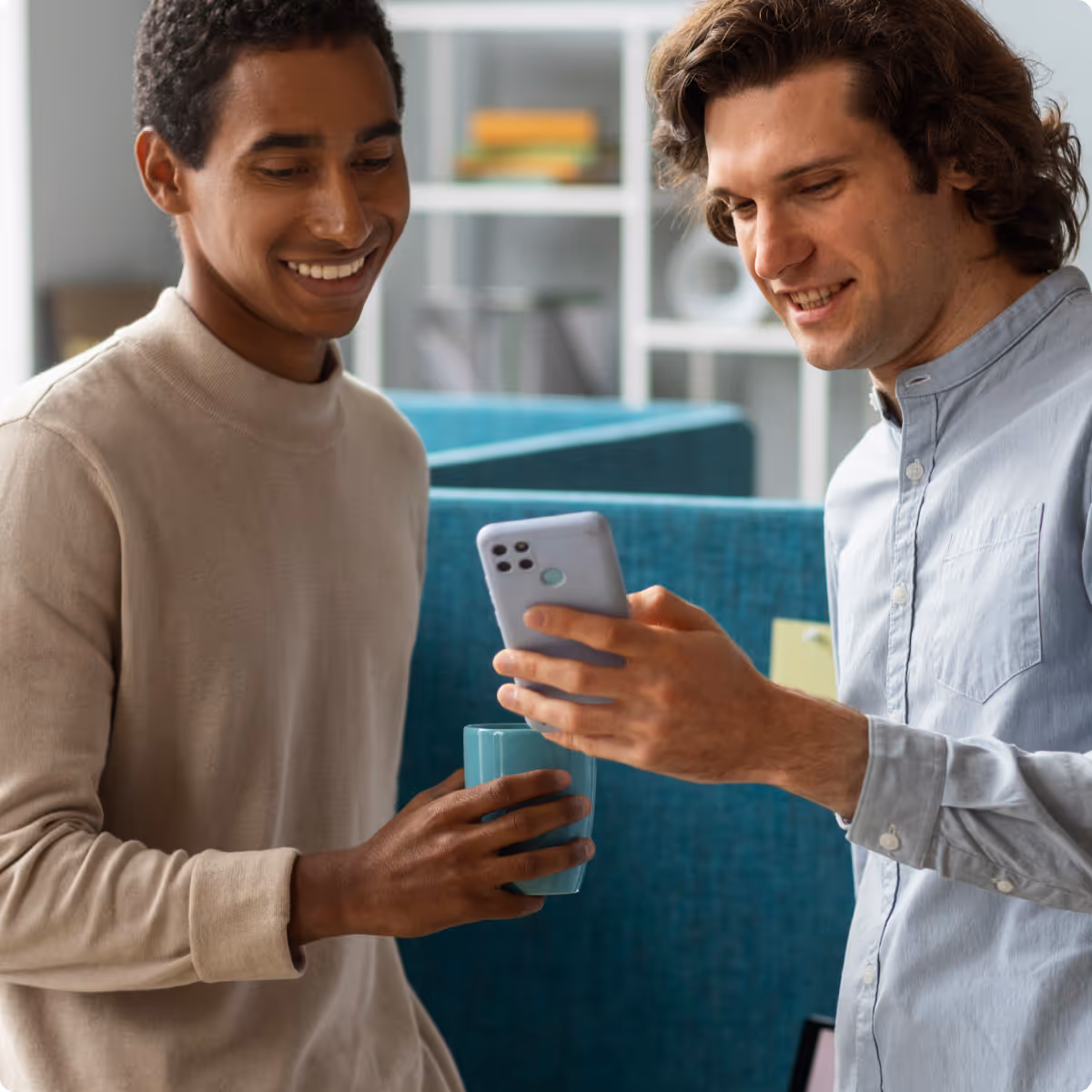 A couple of men standing next to each other.