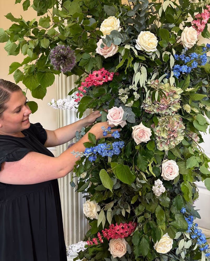 Maddy Shutes arranging flowers