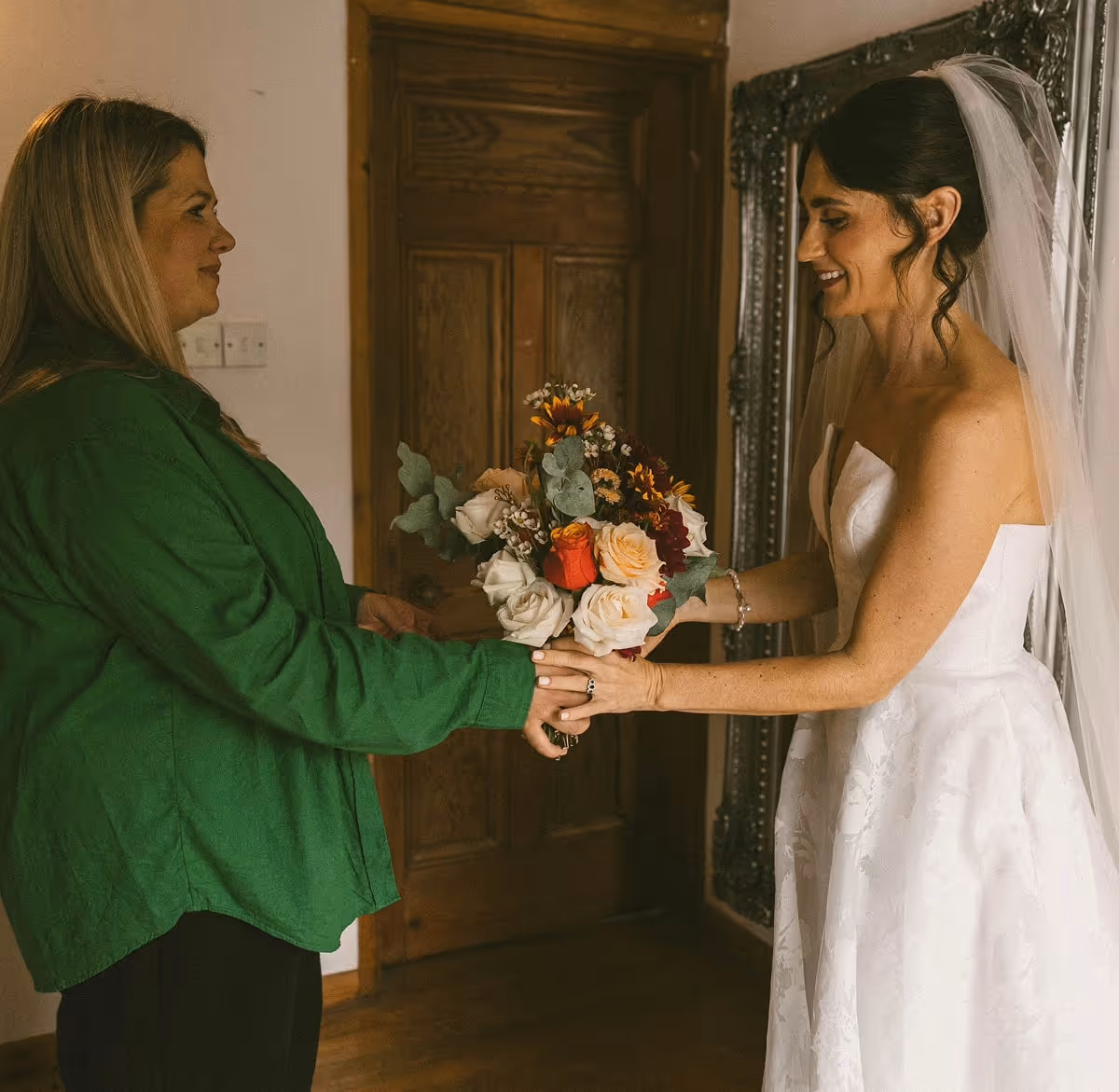 Maddy Shutes handing bride flowers
