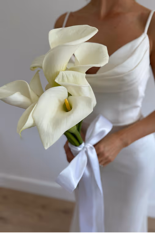 Bride holding flowers