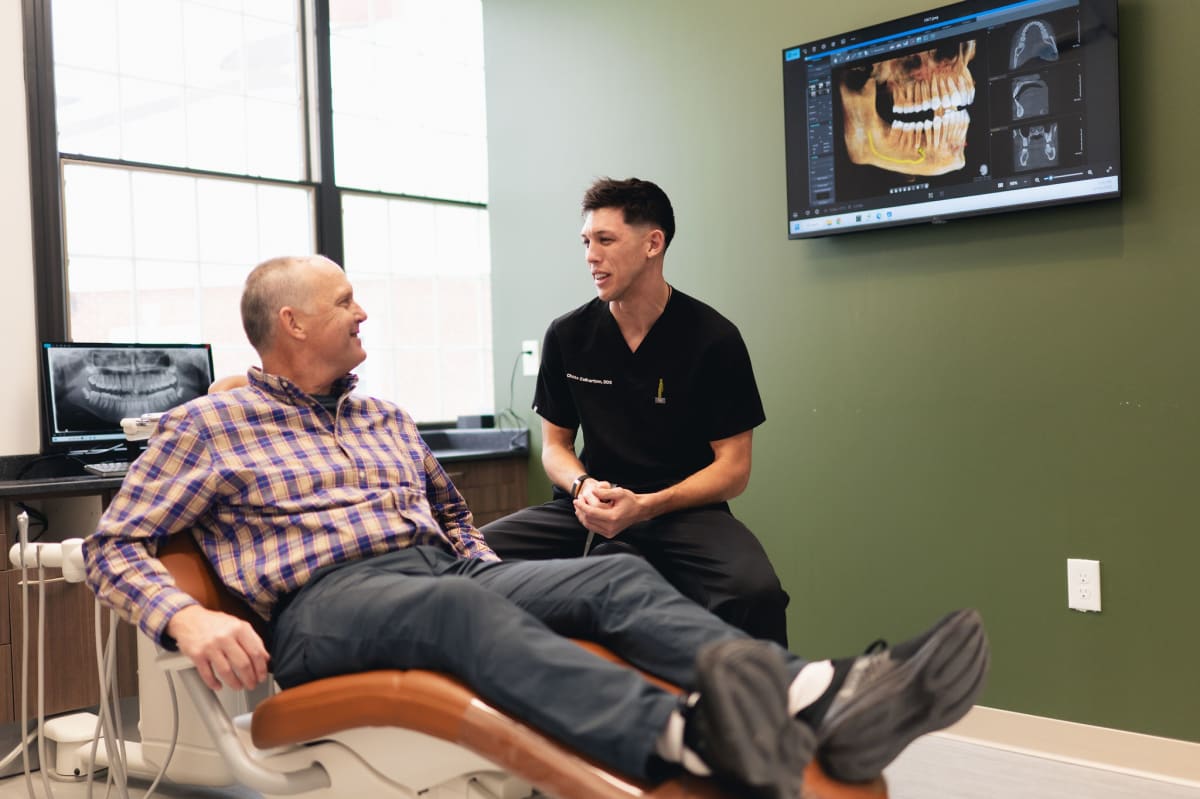 Full mouth rehabilitation patient showing restored smile with improved dental function and aesthetics at Summit Dental Studio