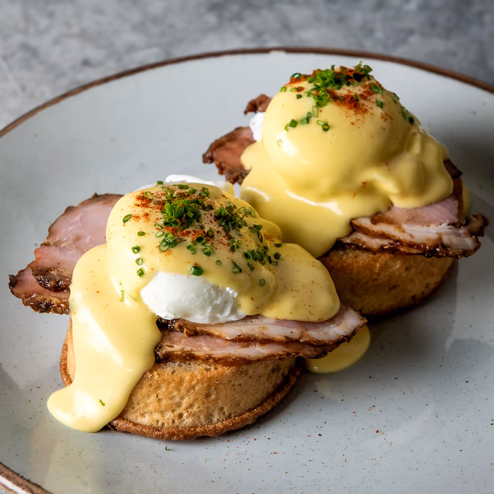Fego Cafe Eggs Benedict with English muffin, poached eggs, hollandaise & bacon