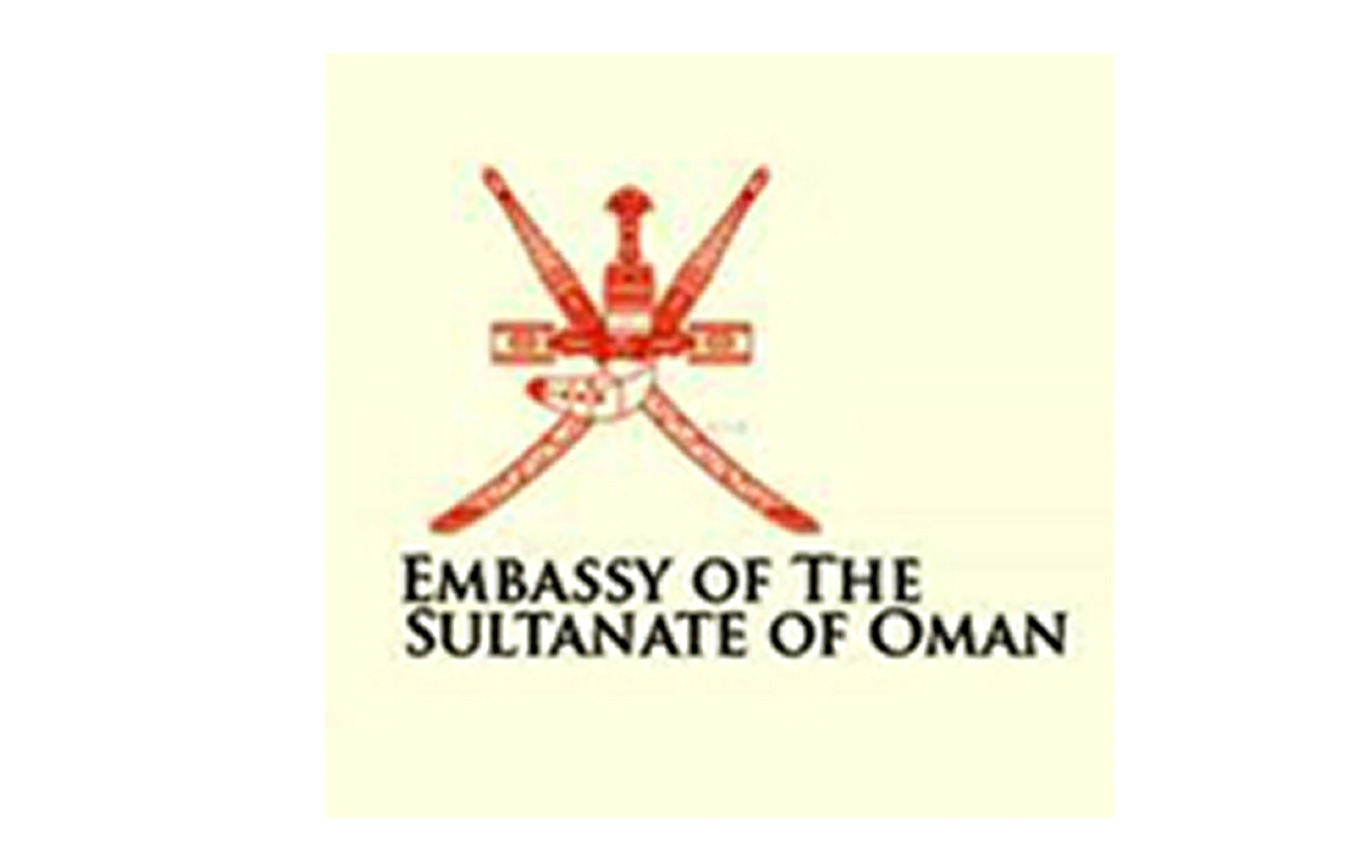 Red emblem of crossed traditional Omani swords above the text Embassy of the Sultanate of Oman.