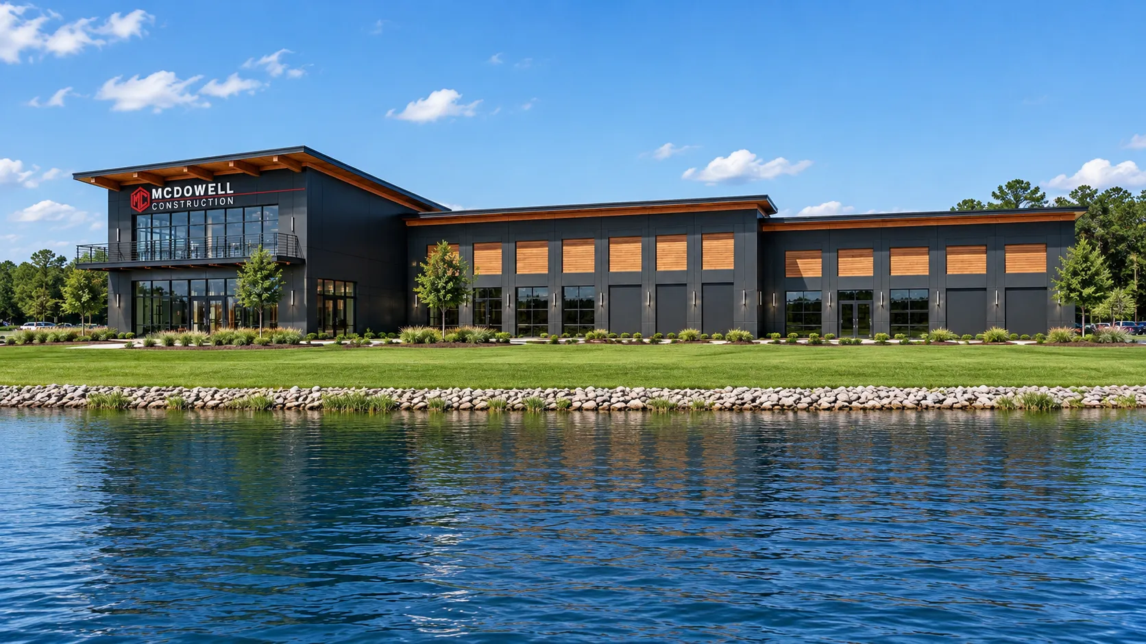 Daytime architectural rendering of McDowell Corporate Center with a pond in front.