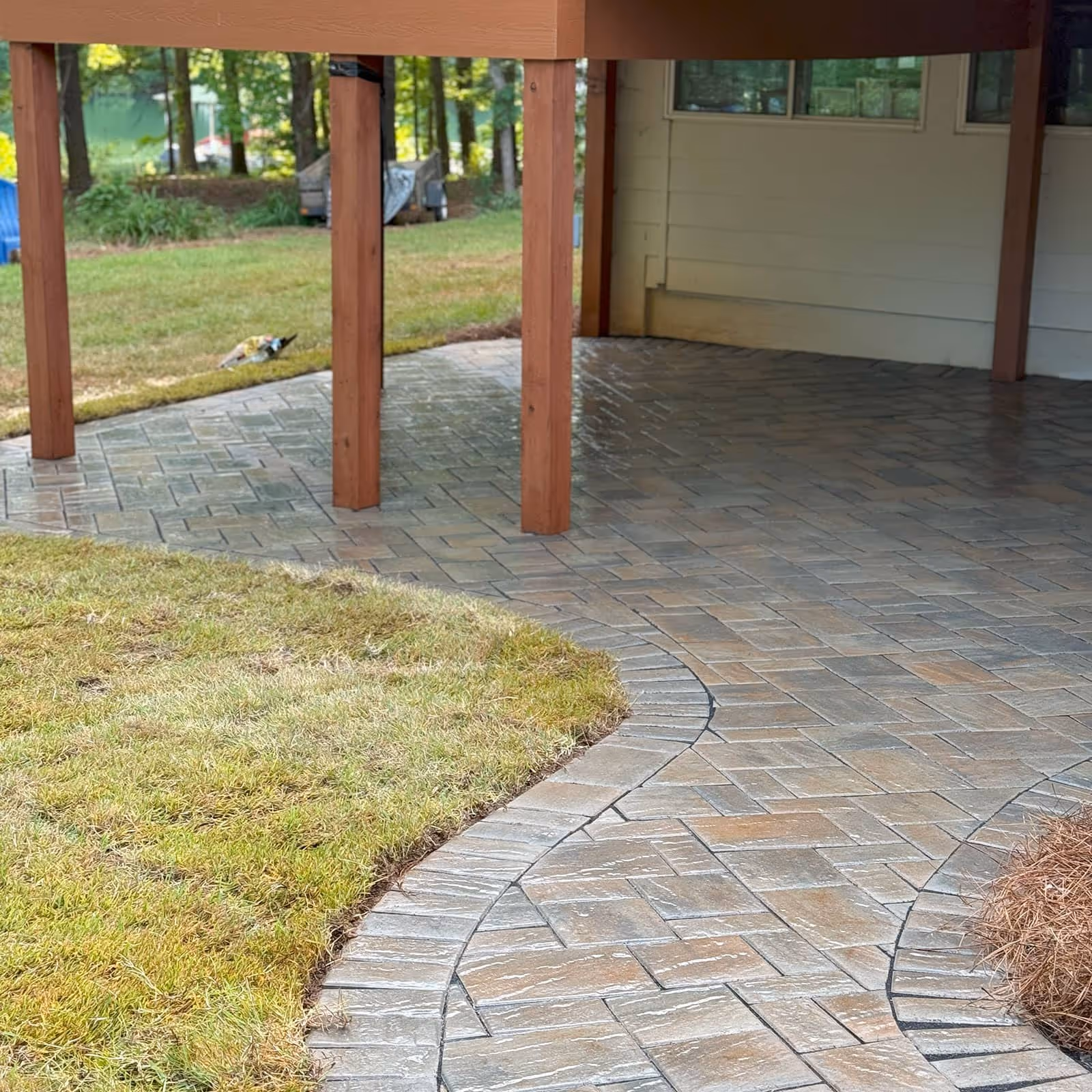 Custom paver patio installation by Southern Stripes Lawn and Landscapes Simpsonville SC near me