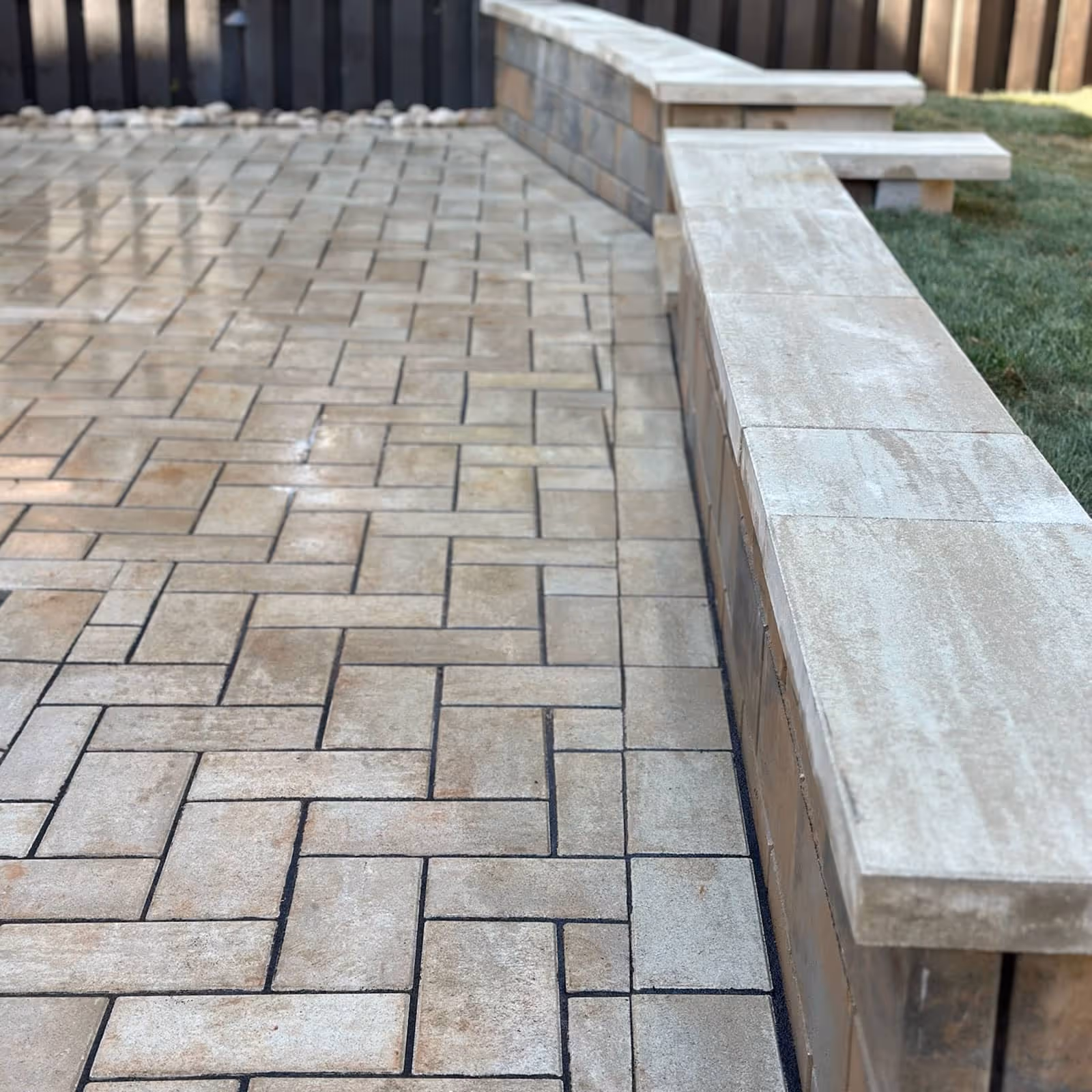 Custom outdoor patio install by Southern Stripes Lawn and Landscapes Simpsonville South Carolina