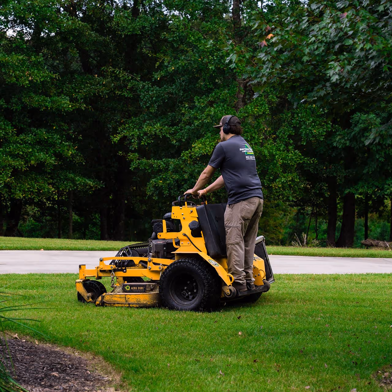 Lush green residential lawn Anderson SC lawn care near me