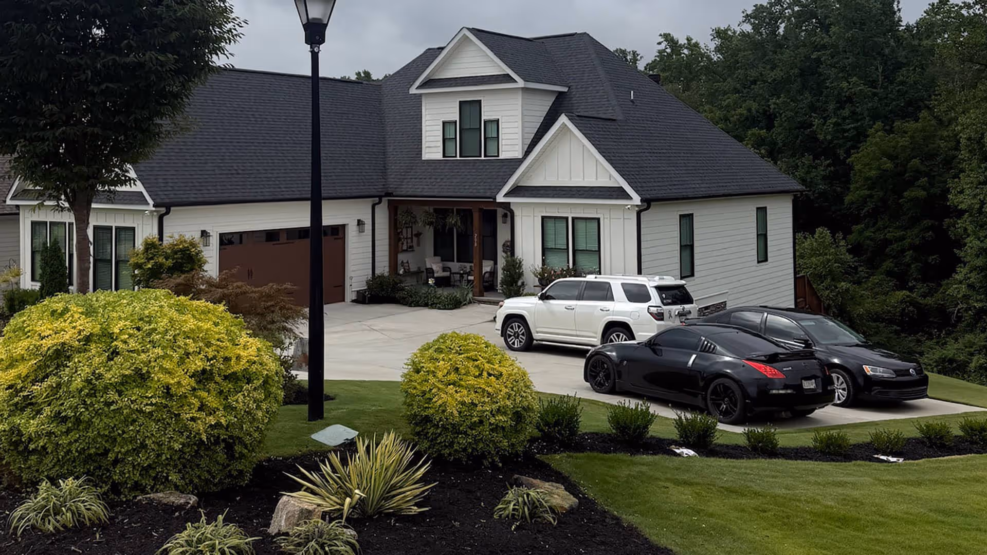 Landscape installation with sod, shrubs and trees by Southern Stripes Lawn & Landscapes Greenville SC near me