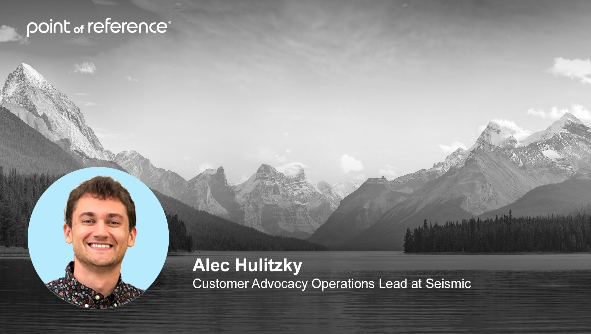Headshot of Alec Hulitzky, Customer Advocacy Operations Lead at Seismic with mountains in the background.