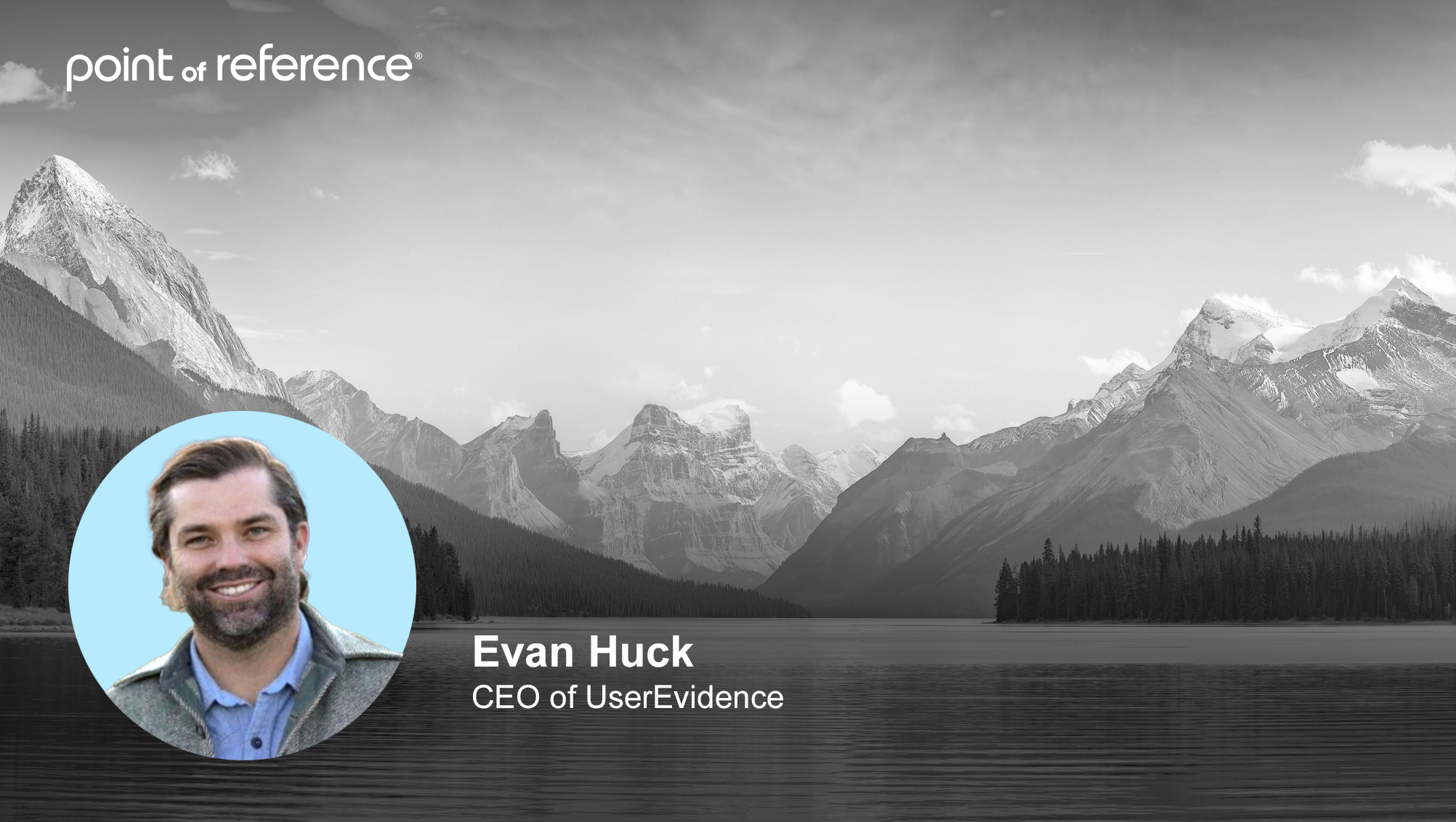 Headshot of Evan Huck, CEO of UserEvidence, expert in customer advocacy marketing, with mountains in the background.