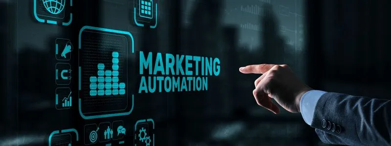 Futuristic looking computerized screen with icons and person pointing at screen that says Marketing Automation.