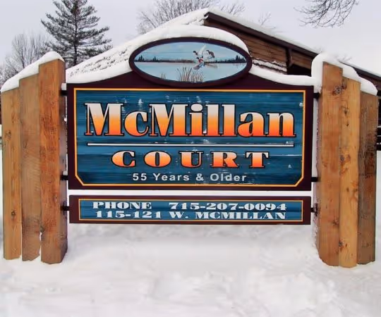 Custom CNS wooden sign design in the snow by Stratford