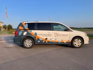 van image with a custom car wrap by stratford