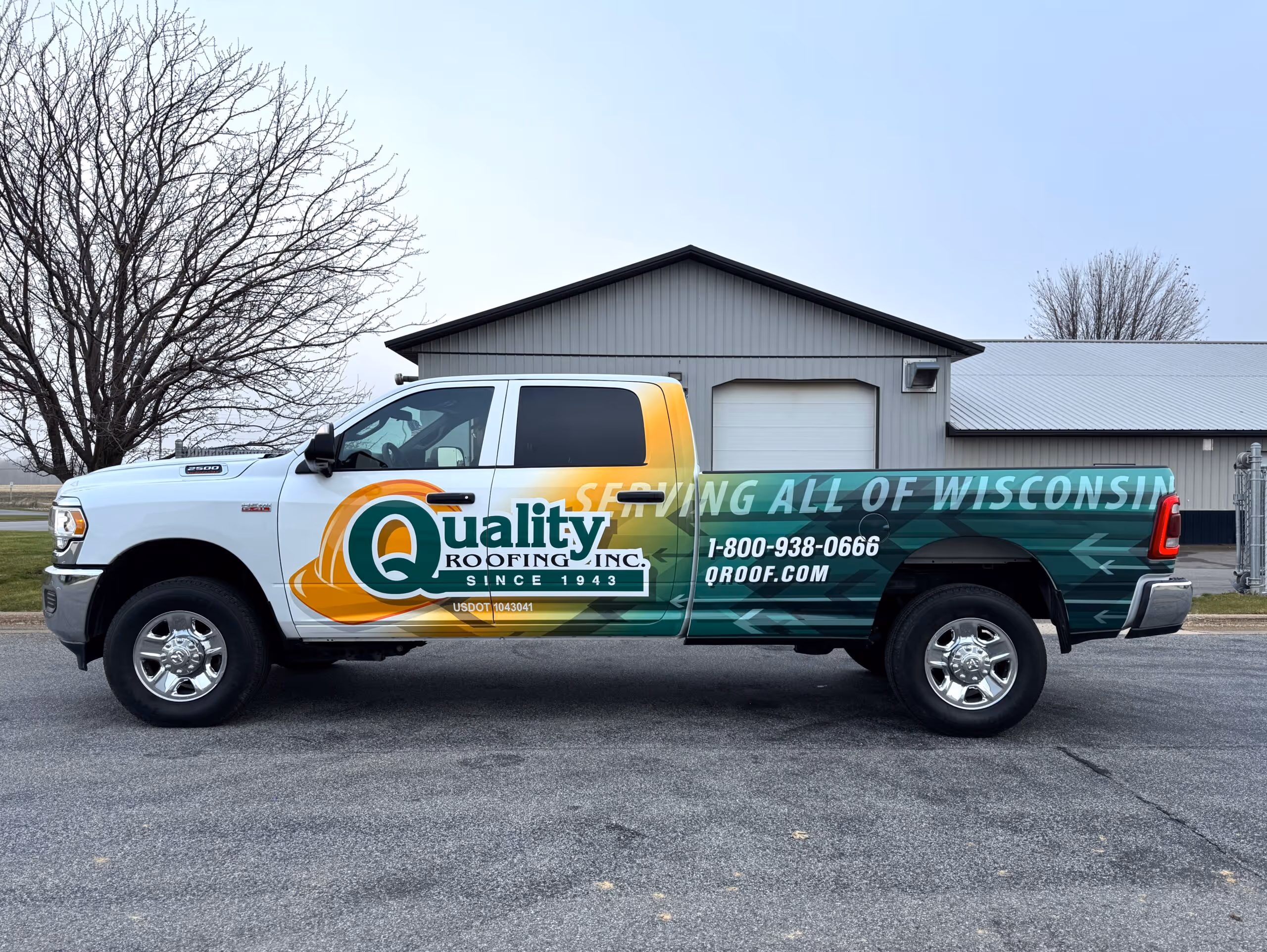 Custom truck wrapper design for a service company by stratford sign co