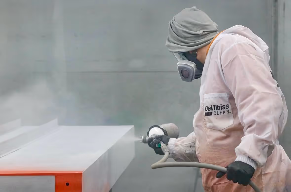 stratford sign co worker working hard on a sign project