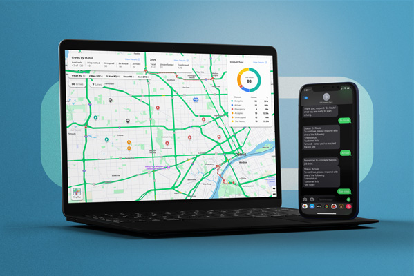 Laptop displaying a map with various colored routes and status indicators, next to a smartphone showing a messaging app with status update conversations.