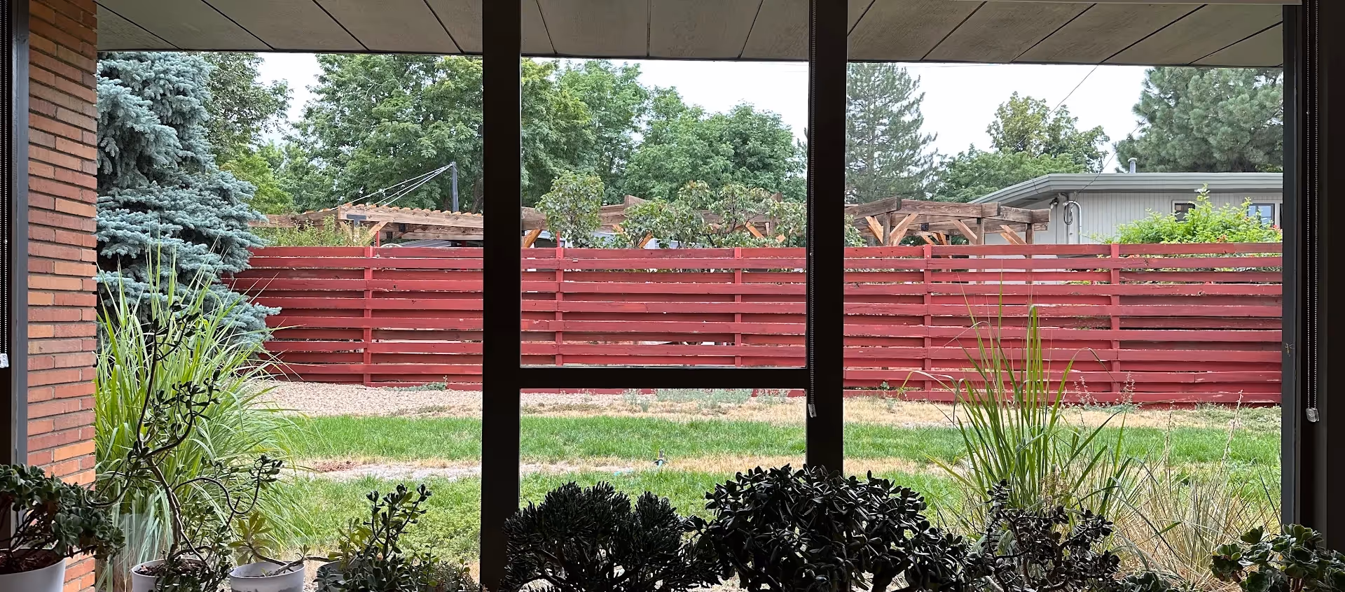 Residential window cleaning technician cleaning interior glass