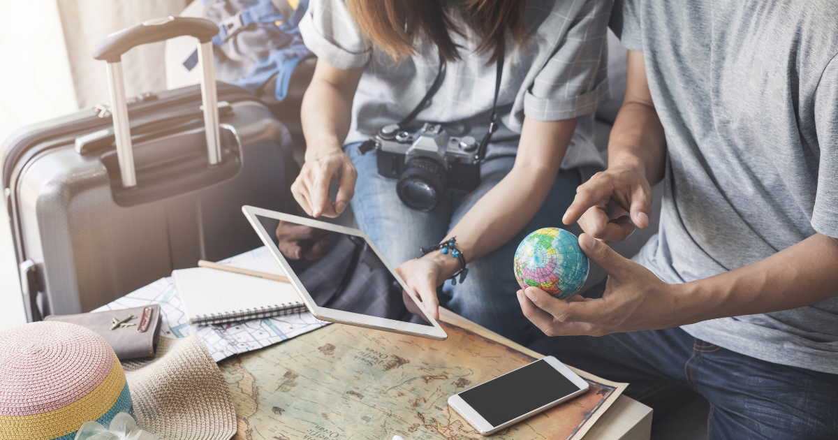 image of a person typing on a laptop
