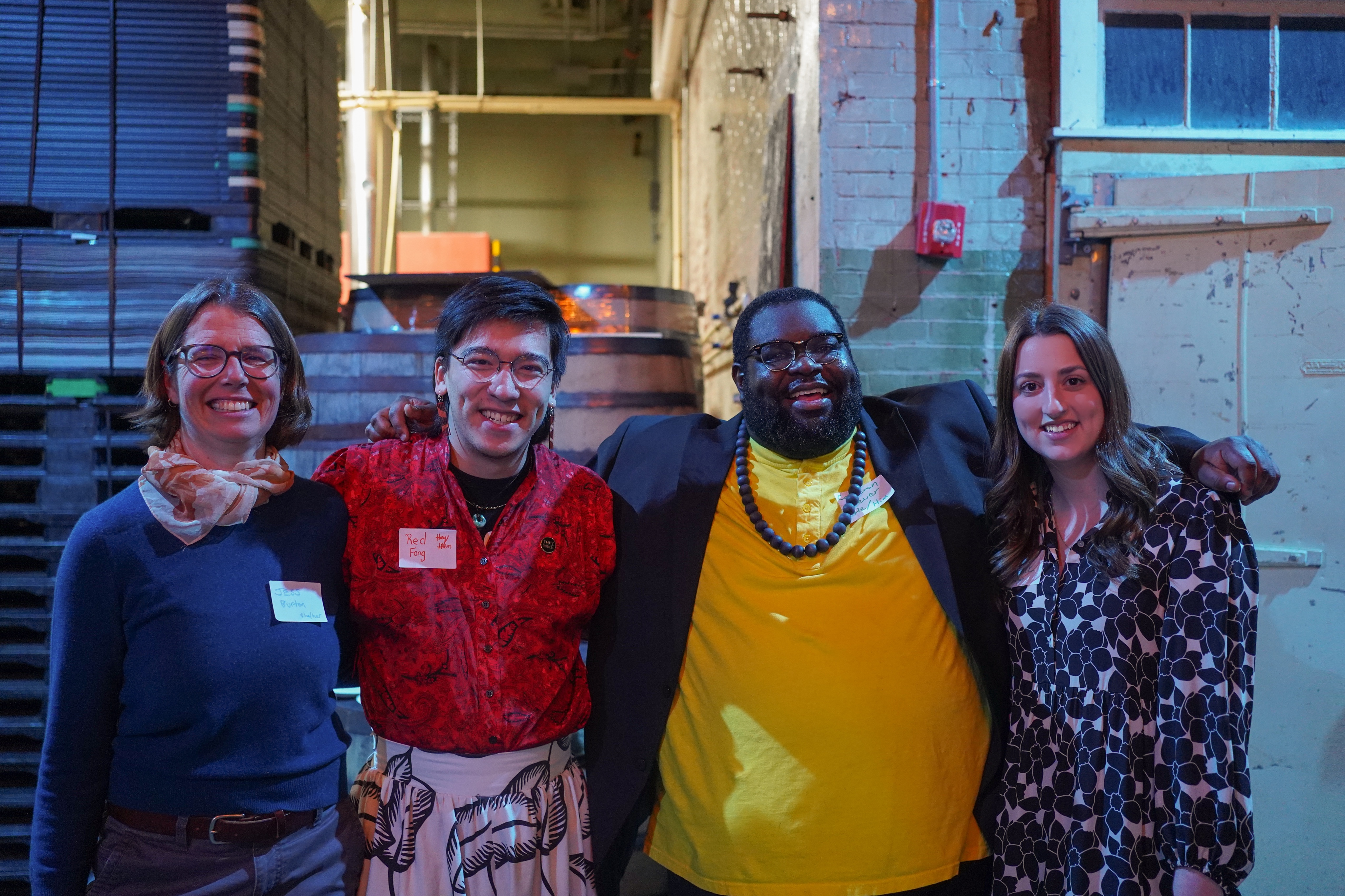 2 Momentum staff standing together smiling