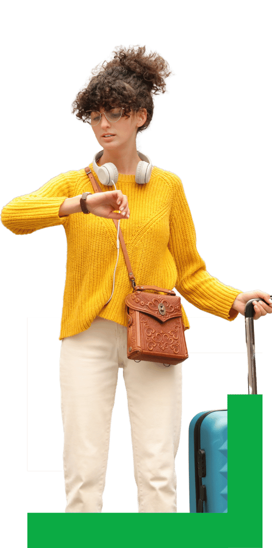 A person wearing a hat, off-shoulder blouse, and denim shorts stands with a suitcase, holding a passport and a camera.