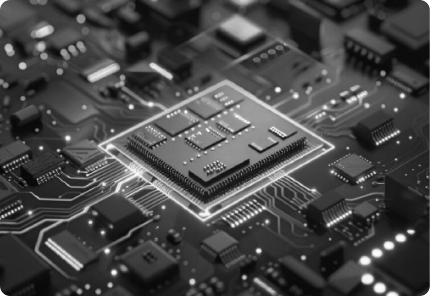 Close-up of a microchip pattern with dark, textured grooves and sharp, bright outlines forming geometric shapes. Monochrome with a high-tech feel.
