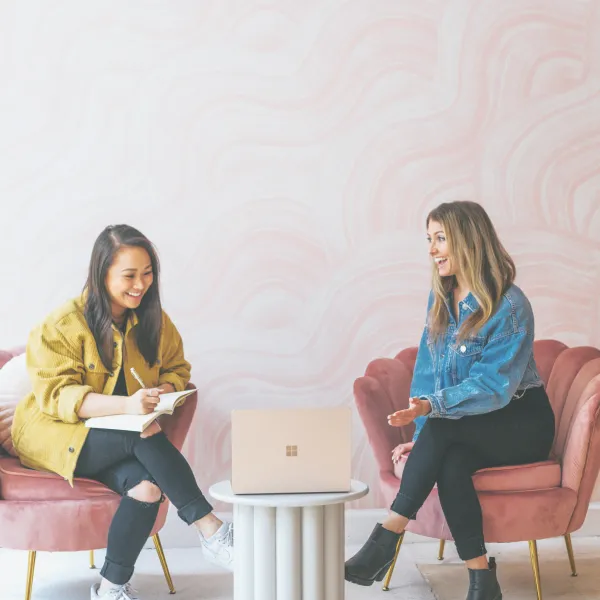 Two women working together on project