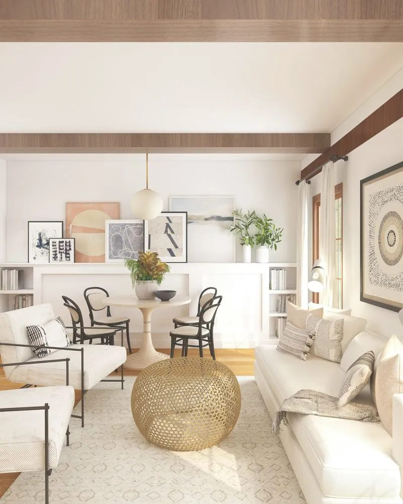 Living room with lots of art and exposed wood ceiling beams