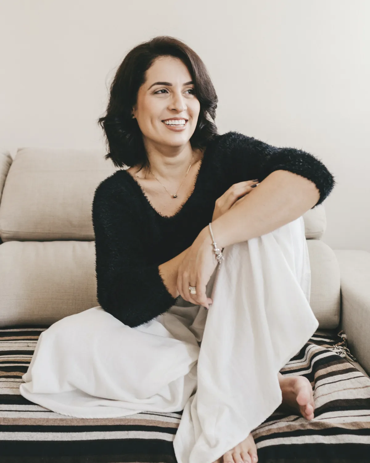 Women wearing black and white in comfortable position