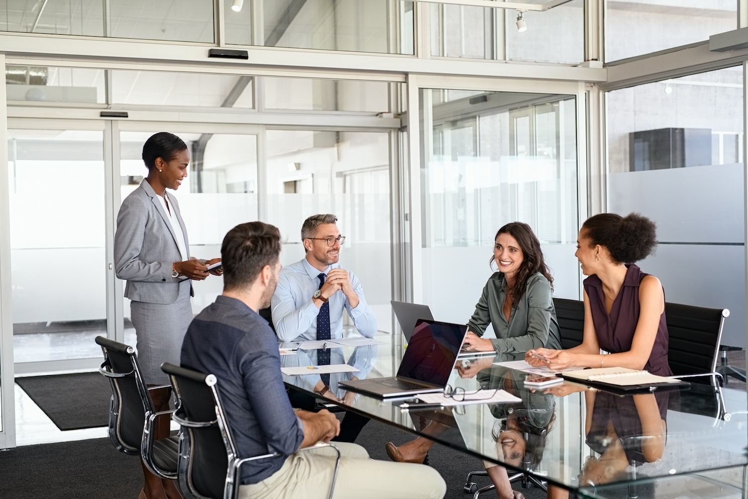 Business Colleagues Meeting Around a Table in Office
