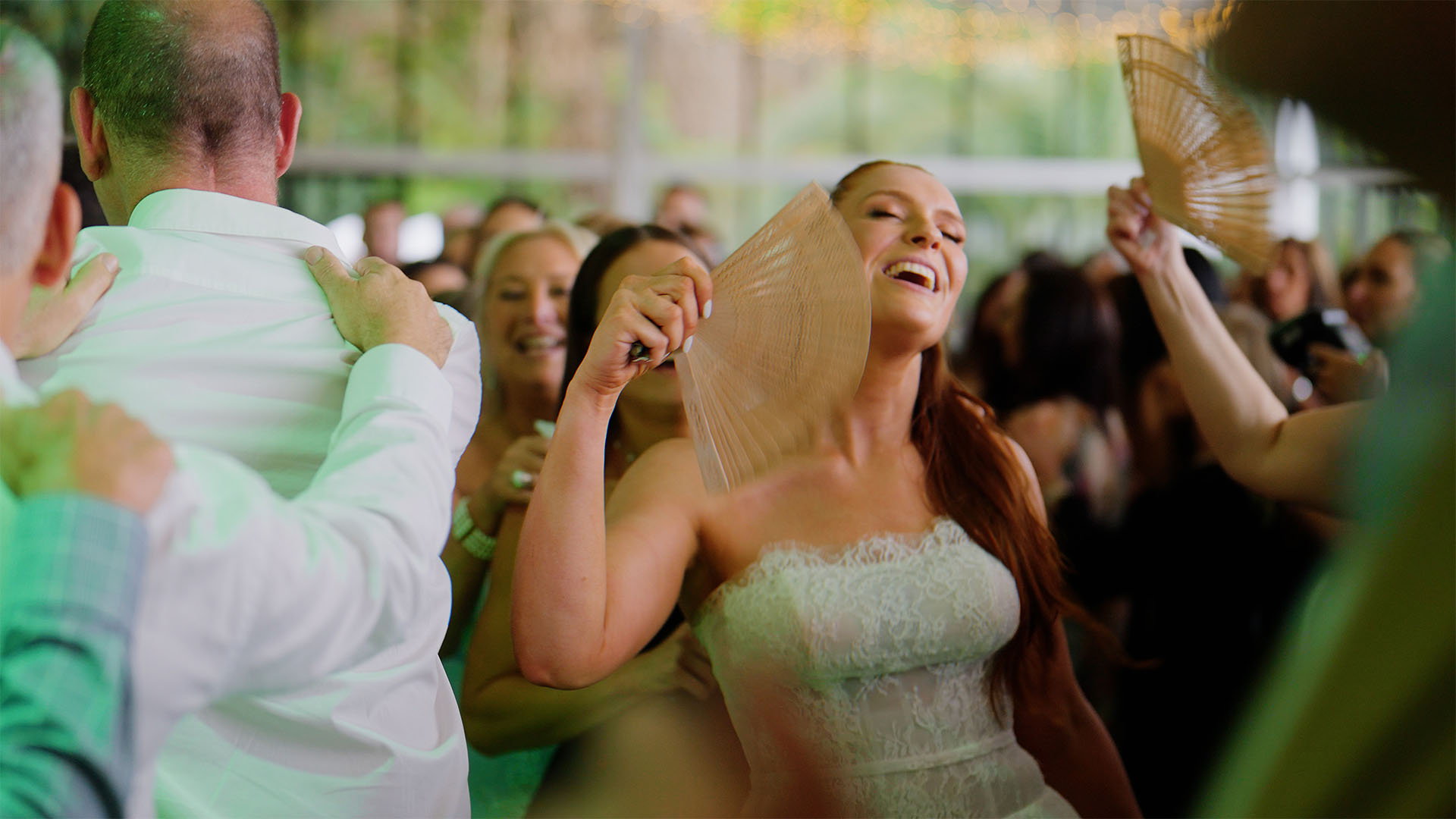 Bride dancing during a jewish wedding hora