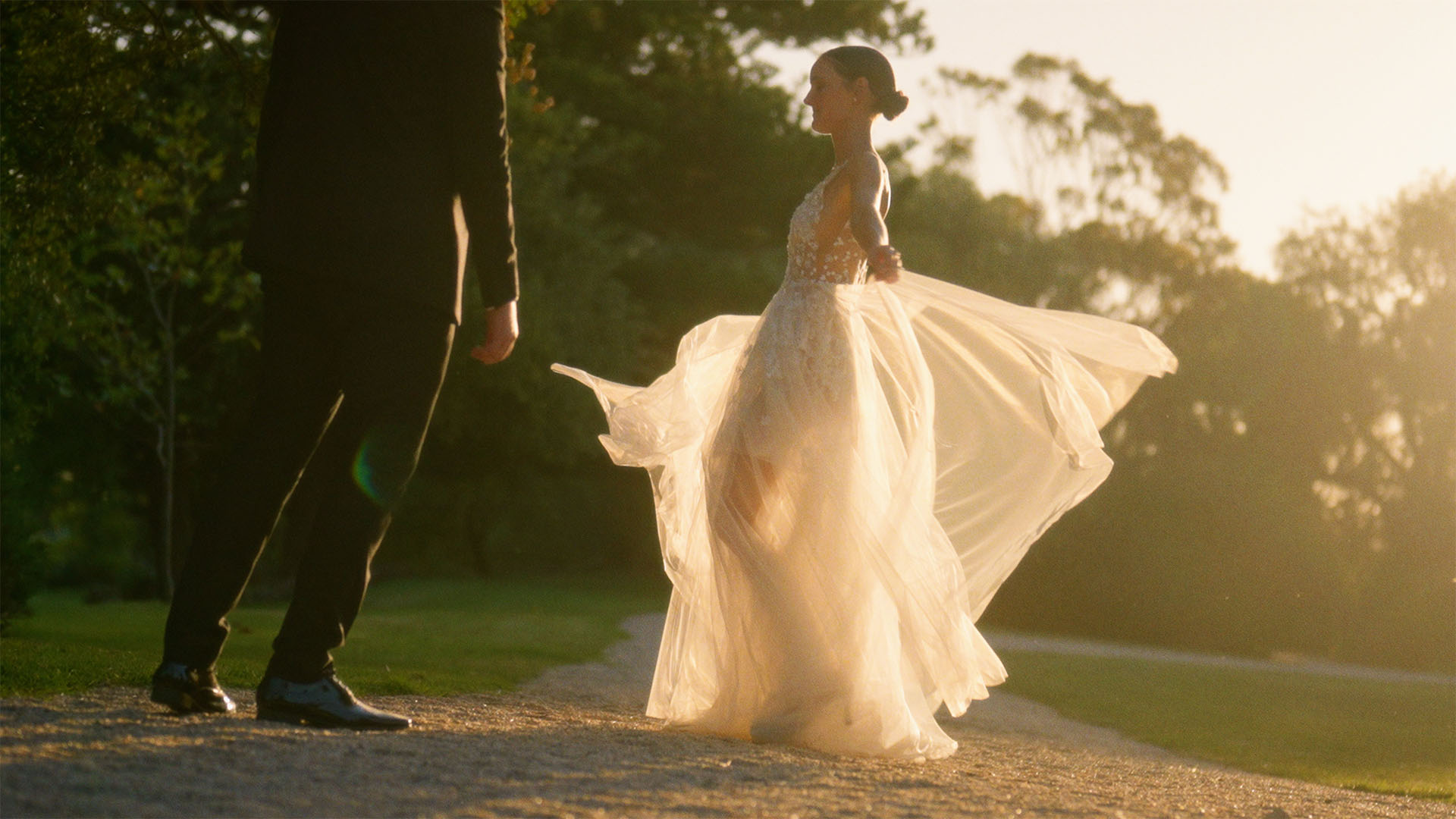 Bride spinning around in her bridal gown at Woolbrook Homestead