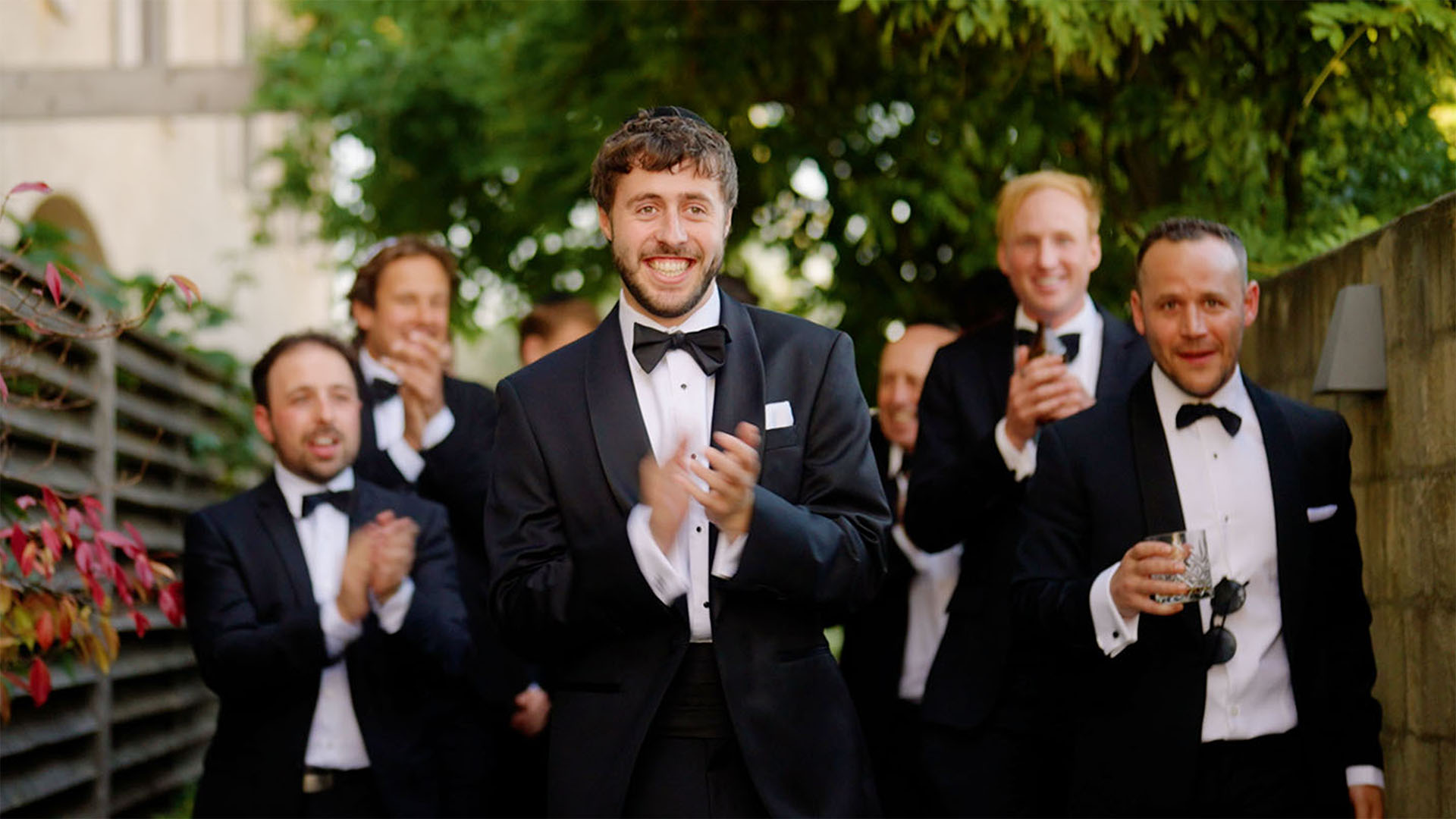 Groom walking to his bride at the bedeken