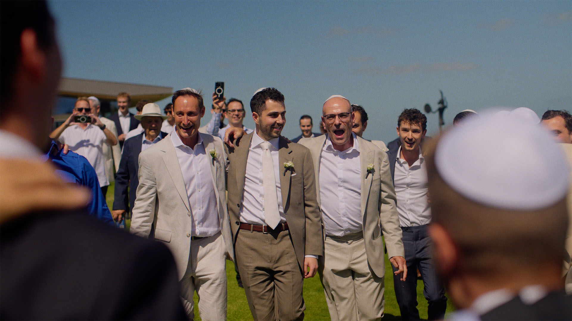 groom walking to the bedeken