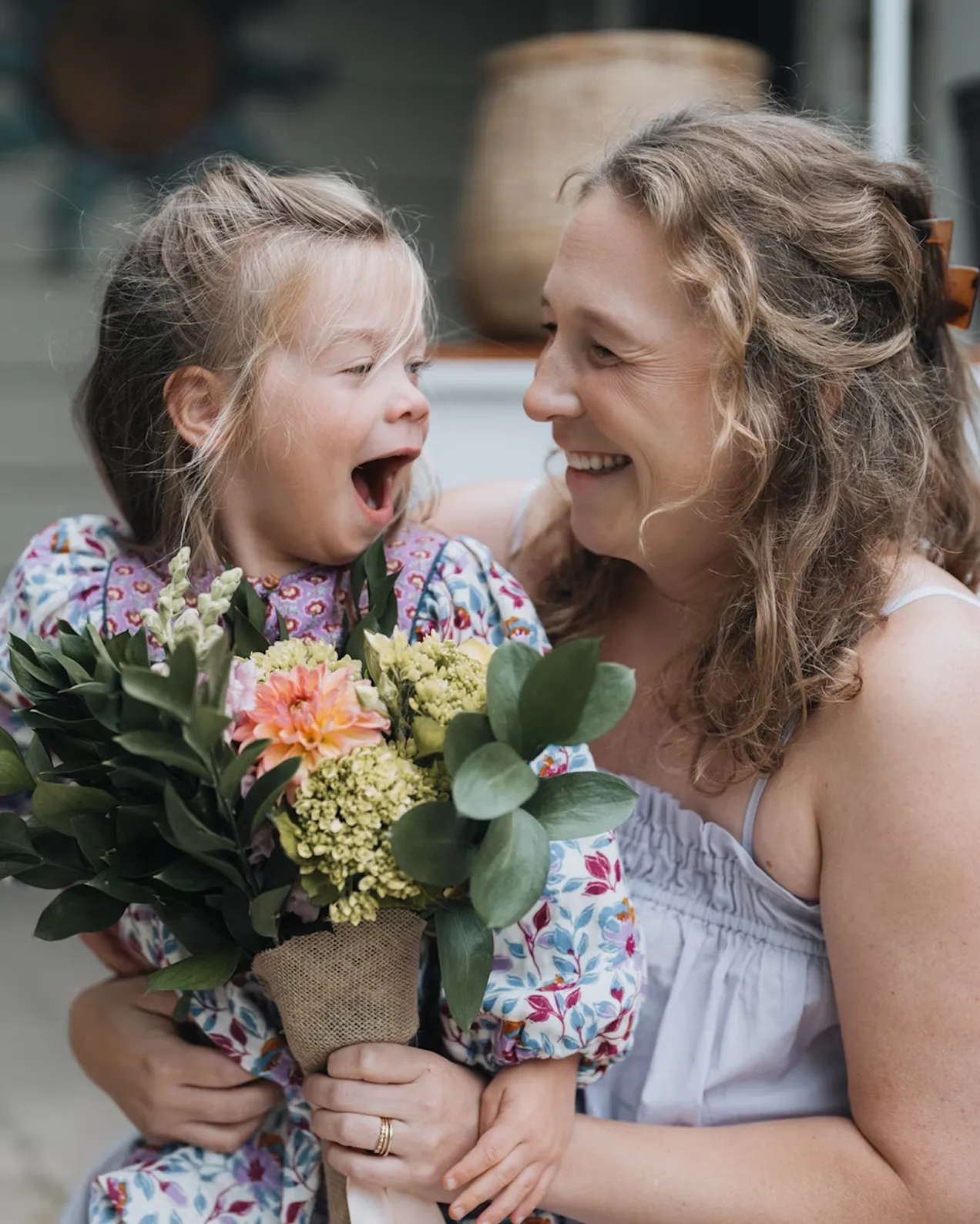 Mother daughter smiling