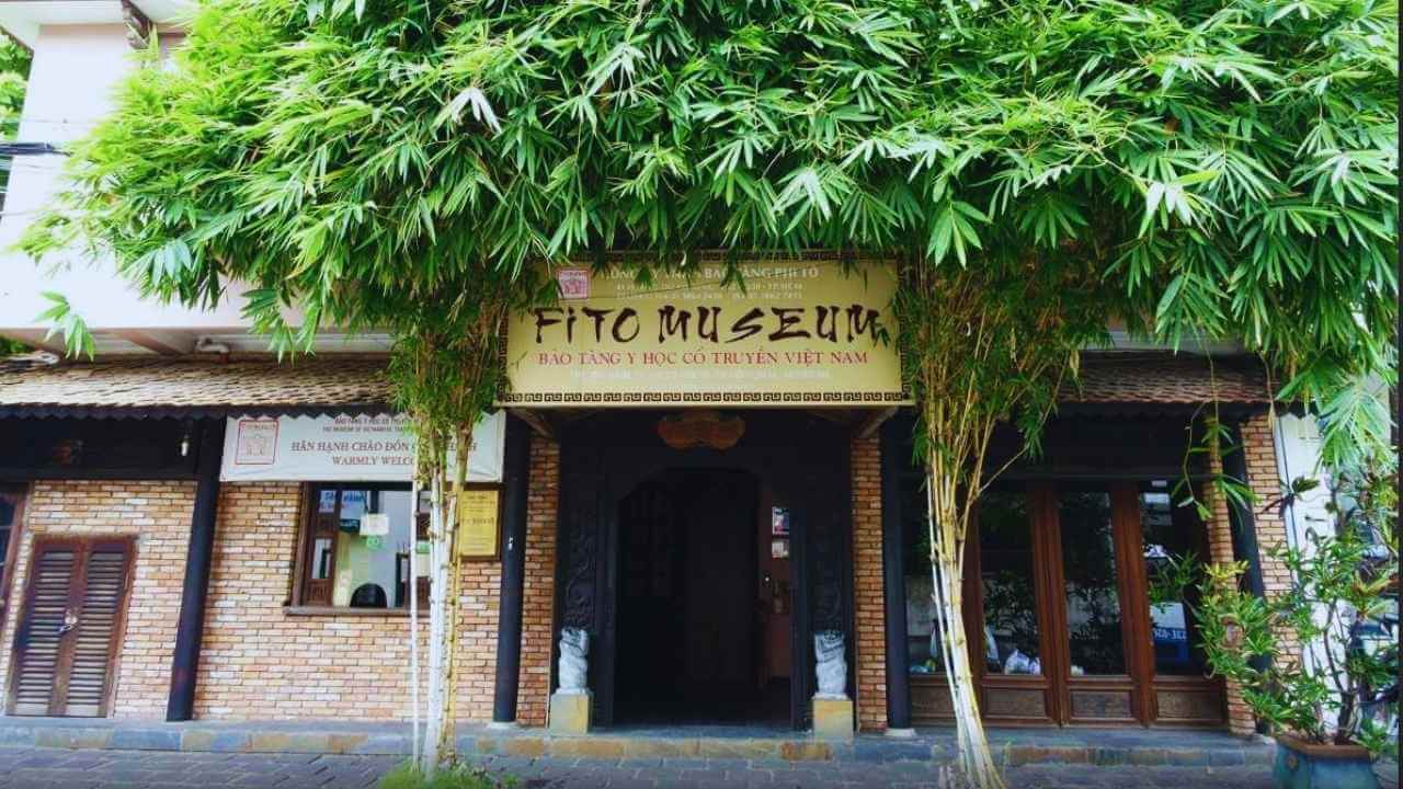 The traditional wooden entrance to the FITO Museum for traditional Vietnamese medicine.